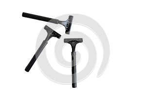 Set of three disposable black razors isolated on white background