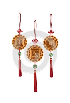 Set of three gold mooncakes hanging pendants with red tassels and jade disks for Chinese Mid Autumn Festival decoration.