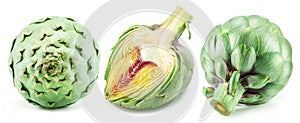 Set of three green artichokes isolated on white background