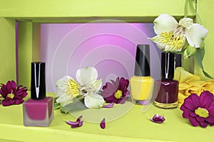 A set of three nail polishes .