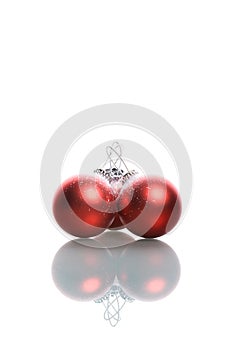 Set of three red christmas balls with reflex