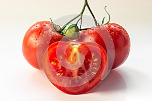 Set of three tomatoes close-up, sliced â€‹â€‹heart-shaped tomato