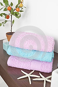 Set of three towels in different colors