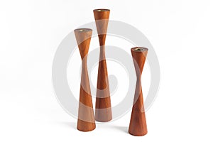 Set of three vintage Danish mid-century teak candleholders.