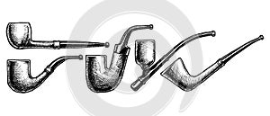 Set of tobacco pipes on white background