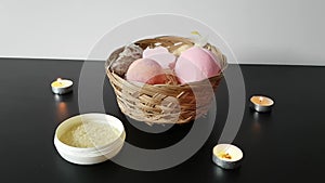 A set of tools for the bath is on the table: bombs for the bath, salt, candles