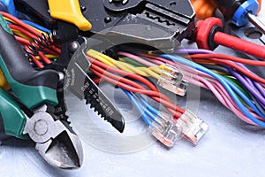 Set of tools for electrician and electrical cables