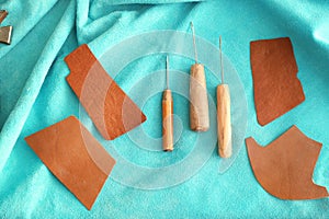Set of tools on leather in workshop
