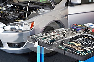 Set of tools on table in car service