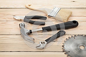 Set of tools on wood background