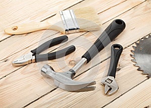 Set of tools on wood background
