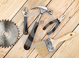 Set of tools on wood background