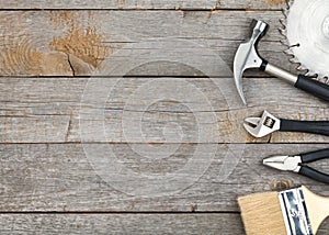 Set of tools on wood background