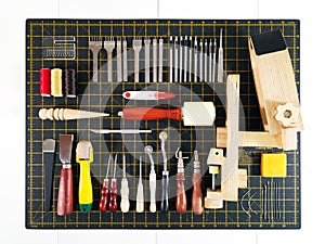 A set of tools for working with leather.