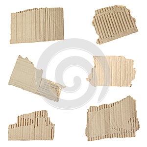 Set of torn cardboard pieces on  background