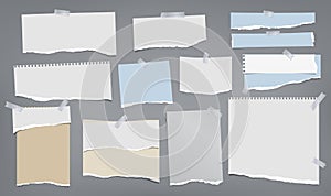 Set of torn white and blue note, notebook paper strips and pieces stuck with sticky tape on dark grey background. Vector