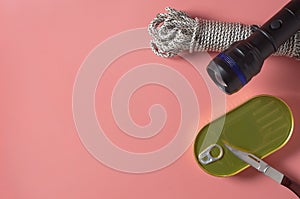 Set of tourist things for survival in journey on pink background. Copy space