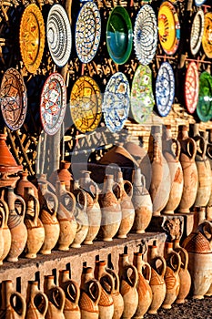 A set of traditional, handmade Moroccan clay dishes. Bowls, plates, tagines, jugs