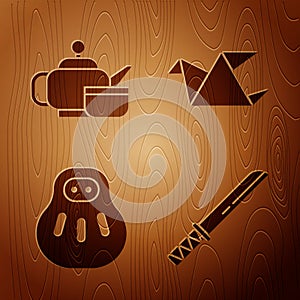 Set Traditional Japanese katana, Japanese tea ceremony, Maneki neko cat and Origami bird on wooden background. Vector