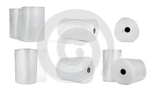 Set with transparent bubble wrap rolls on white background