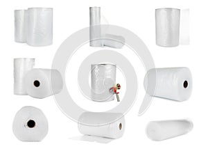 Set with transparent bubble wrap rolls on white background