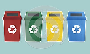 Set of trash bins with recycle symbol