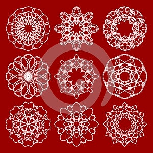 Set of trendy vintage monoline circle patterns. Geometric symmetric lace patterns in art deco design.