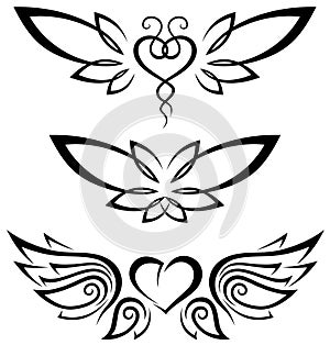 Set of tribal tattoos including hearts with wings