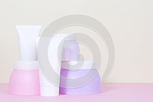 A set tubes of creams. Pastel colors.