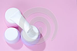A set tubes of creams. Pastel colors.
