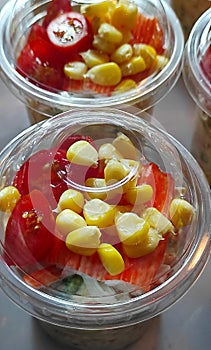 Set of Tuna corns salad with small tomatoes and salad creams homemade for sales people who loves healthy menu.