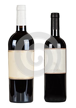 Set of two bottles with blank labels of red wine isolated on white background