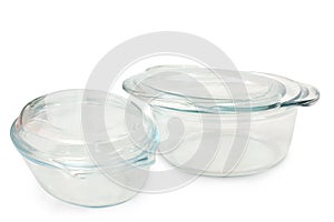 A set of two glass saucepans