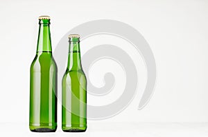 Set of two green longneck beer bottles 330ml, mock up.