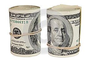 Set of two rolls of hundred us dollars standing up and isolated on white background photo
