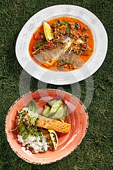 Set of Two Seafood Dishes with Syrdak, Salmon Steak and Rice