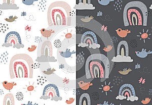 Set of two vector seamless patterns with rainbow, birds, clouds, sun, raindrop. Childish texture for fabric, textile.