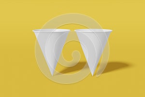 Set of two white paper mockup cups cone shaped on a yellow background. 3D rendering