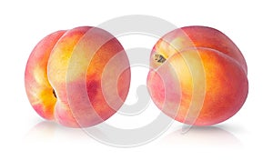 Set of two whole peach fruits isolated on white background