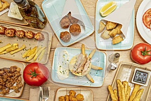 Set of typical dishes for tapas in Spanish style photo