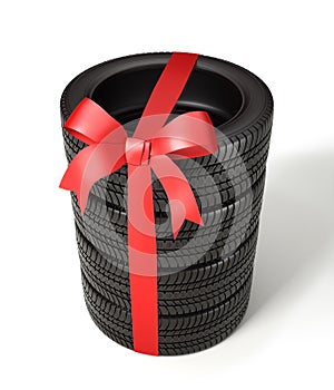 Set tyres are stacked and packaged as a gift, wrapped red ribbon
