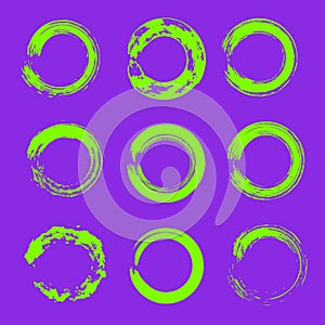 set of ufo green grunge circle brush strokes for frames, icons, design elements on proton purple color trends 2019 background