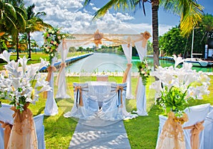 Set up for a tropical destination wedding in Marina Hemingway, H