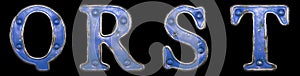 Set of uppercase letters Q, R, S, T made of painted metal with blue rivets on black background. 3d