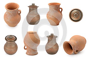 Set of varied earthenware jugs isolated on white