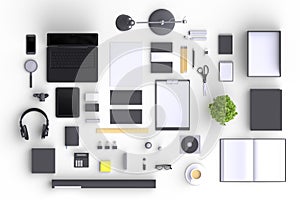 Set of variety blank office objects organized for company presentation or branding identity with blank modern devices.