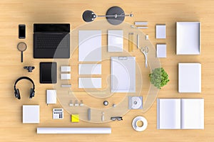 Set of variety blank office objects organized for company presentation or branding identity with blank modern devices.