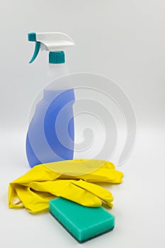 Set of various bright cleaning items, bottles, utensils, supplies. Home cleaning, housekeeping concept.