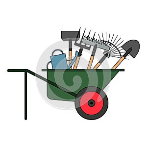 Set of various gardening tools in a wheelbarrow. Items for gardening and farming. Set of farm tools. Garden instruments collection