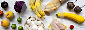 Set of various organic food on white wooden background, overhead view. Cooking food background. Health food concept